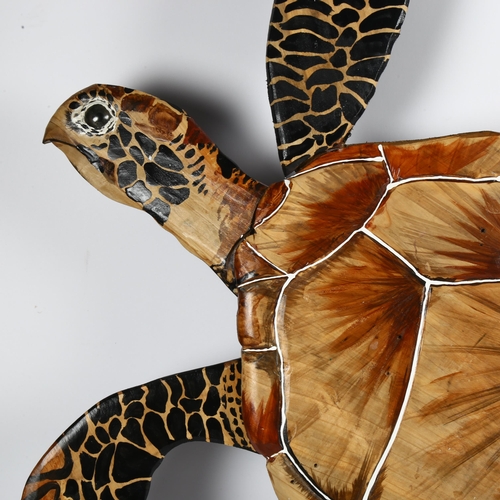 655 - A painted wood wall-mounted turtle, 92cm