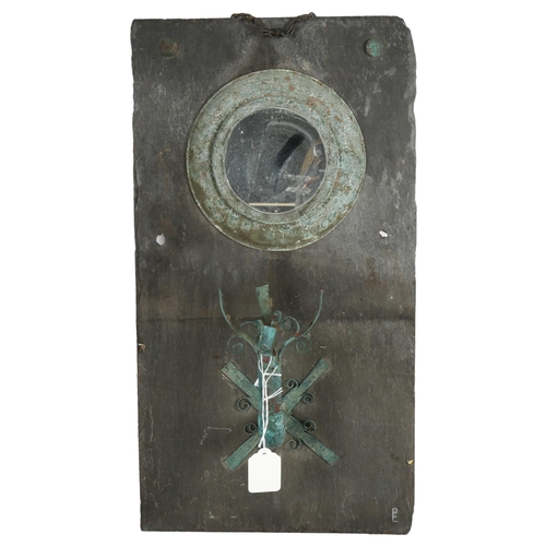 656 - A slate-backed wall mirror with sconce, height 56cm