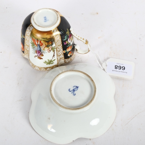 668 - A 19th century Dresden cabinet cup and saucer, with painted panels