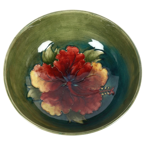 680 - A Moorcroft bowl with tube-lined floral decoration (A/F), diameter 19cm