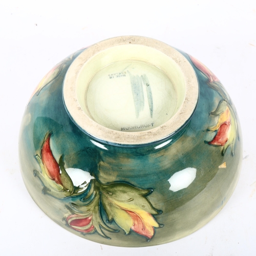 680 - A Moorcroft bowl with tube-lined floral decoration (A/F), diameter 19cm