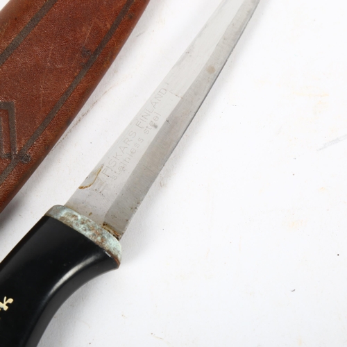 689 - A Normark dagger in leather sheath, 27cm