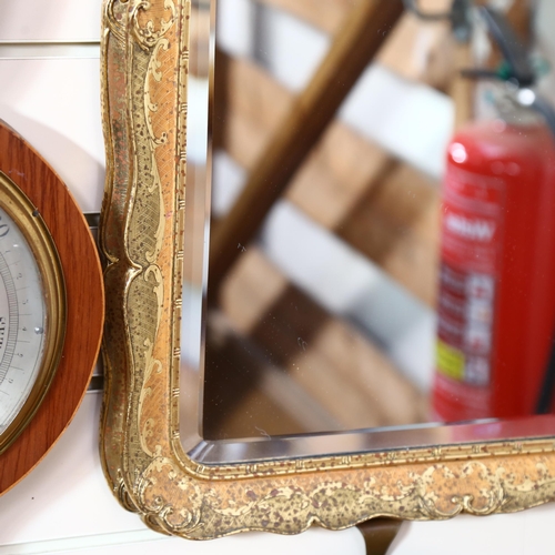 696 - A Vintage arch-top bevel-edge wall mirror, with moulded painted and gilded frame, height 83cm