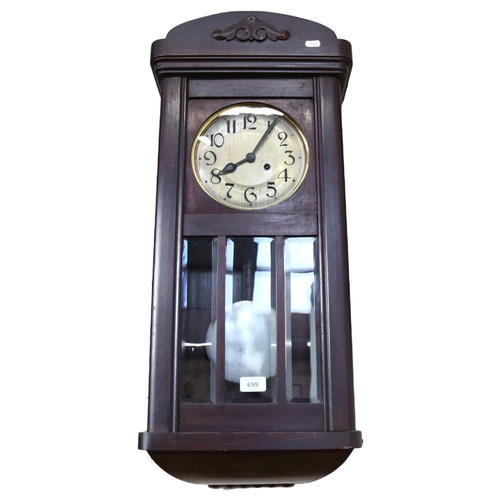 699 - A oak-cased 8-day wall clock, 78cm