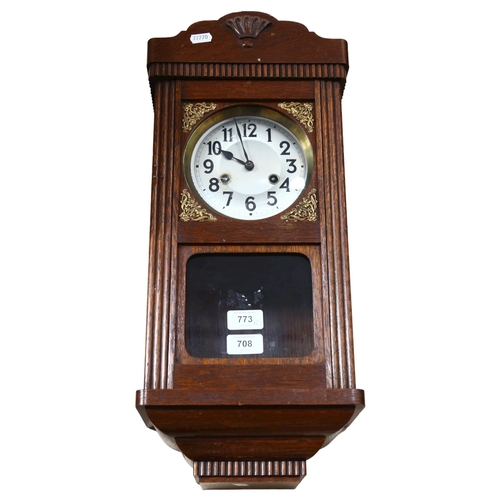 708 - A Vintage stained oak 8-day drop-dial wall clock, case height 55cm, with pendulum