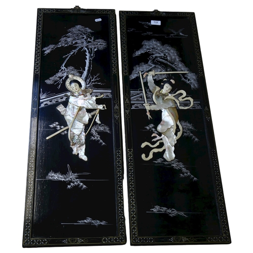 715 - A pair of Vintage Japanese lacquered panels, with applied mother-of-pearl decoration, 94cm