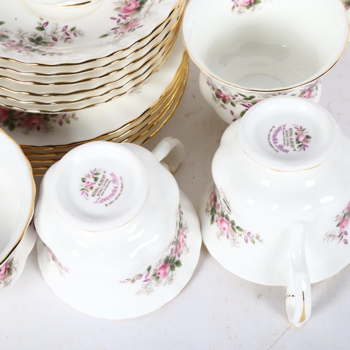 733 - Royal Albert Lavender Rose, a part tea service including 1 large serving plate, tea plates, tea cups... 