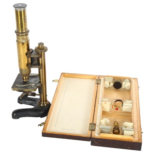 278 - A C Wrichert Wien microscope, Number 3, serial no. 25137, and a wooden box containing various slides... 