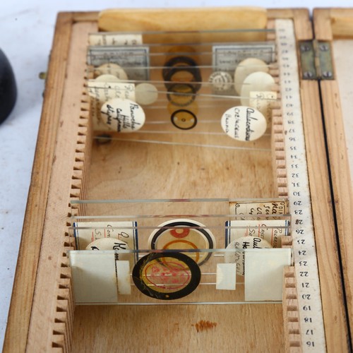 278 - A C Wrichert Wien microscope, Number 3, serial no. 25137, and a wooden box containing various slides... 