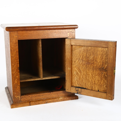 377 - An early 20th century oak smoker's cabinet, H35cm, L32cm, W26cm