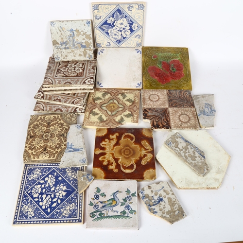 390 - A quantity of Antique and modern ceramic tiles with various designs, including some Delft, largest 1... 