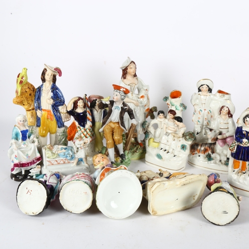 401 - A group of Victorian Staffordshire and Continental figures, and a fairing, tallest 22.5cm