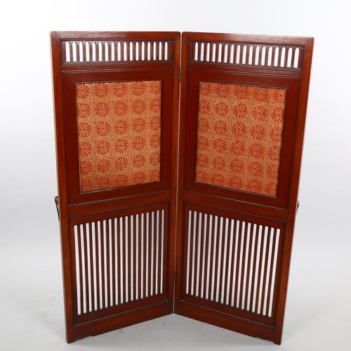 2298 - A 19th century mahogany double-sided 2-fold screen in Japanese style, 1 side having drop-down shelve... 