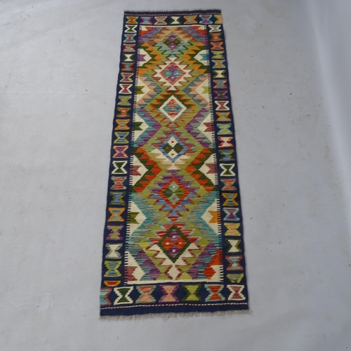 2338 - A Chobi Kilim runner, 200 x 69cm