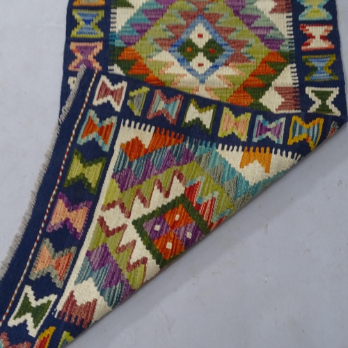 2338 - A Chobi Kilim runner, 200 x 69cm