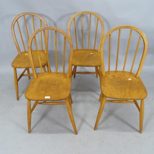 2295 - A set of four mid-century elm seated stick back dining chairs