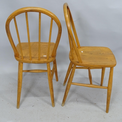 2295 - A set of four mid-century elm seated stick back dining chairs