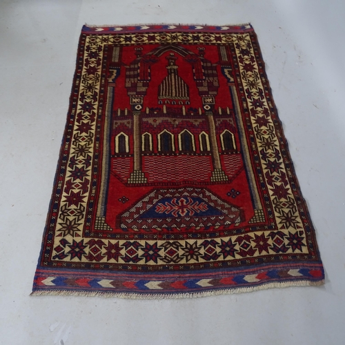 2307 - An antique red ground Baluchi rug. 152cm x 99cm