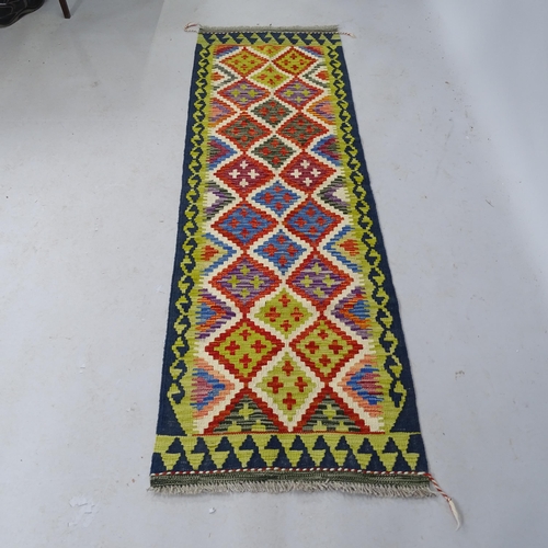 2310 - A Chobi Kilim Runner. 186cm x 60cm