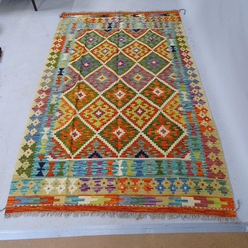 2311 - A Chobi Kilim rug. 210cm x 133cm