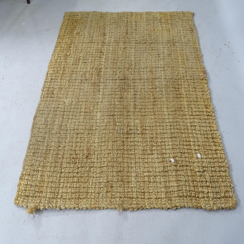 2316 - A beige-ground Safavieh jute rug. 170cm x 110cm