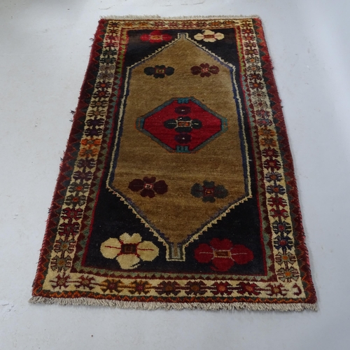 2320 - A red-ground Persian design rug. 160cm x 90cm