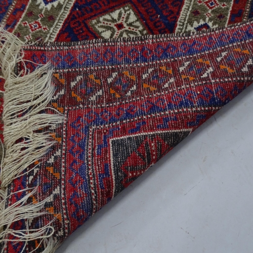 2325 - An Afghan red-ground prayer rug. 143cm x 78cm