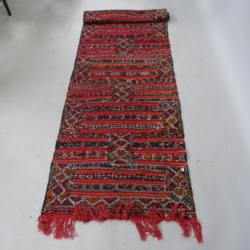 2326 - A Moroccan Kilim runner. 300cm x 80cm