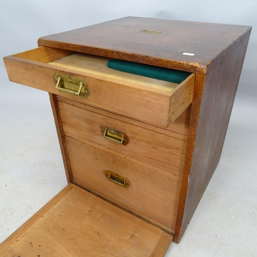 2647 - An antique mahogany campaign chest of four drawers with inset brass carrying handle. 50cm x 60cm x 5... 