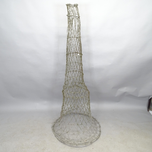 2667 - A vintage metal eel trap. Height 160cm.