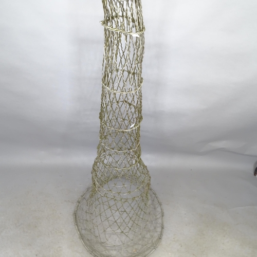 2667 - A vintage metal eel trap. Height 160cm.