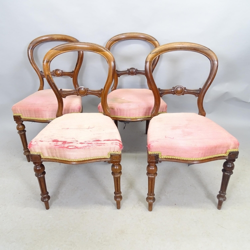 2679 - An antique set of four mahogany balloon back dining chairs