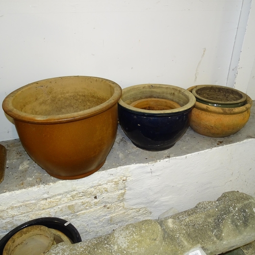 2685 - Five various glazed terracotta garden pots. Largest 48cm x 35cm.