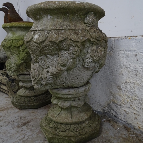 2686 - A pair of weathered concrete two section garden planters on stands. 39cm x 62cm
