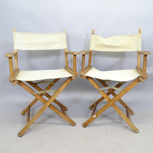 2692 - A pair of folding director's chairs.