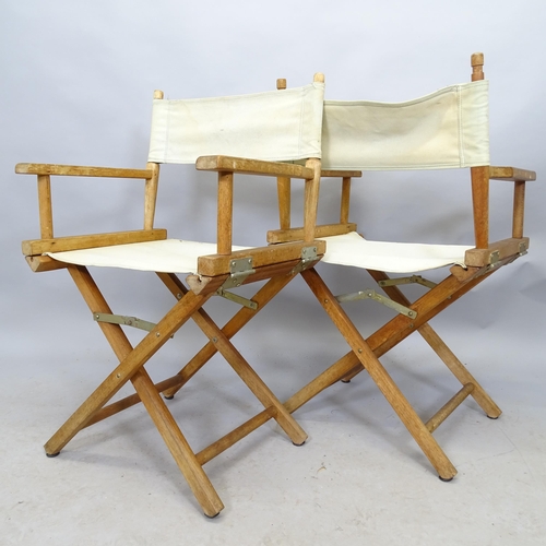 2692 - A pair of folding director's chairs.