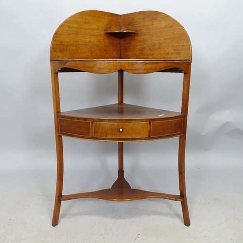 2694 - An Edwardian mahogany and satinwood strung corner washstand with single fitted drawer. 66cm x 100cm ... 