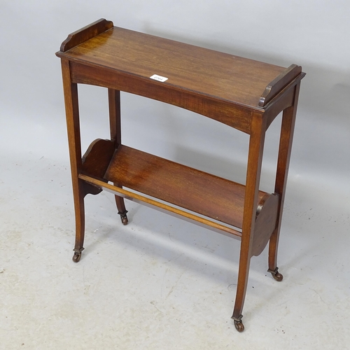 2704 - An Edwardian mahogany two-tier book trough. 56cm x 68cm x 23cm