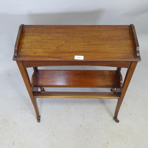 2704 - An Edwardian mahogany two-tier book trough. 56cm x 68cm x 23cm