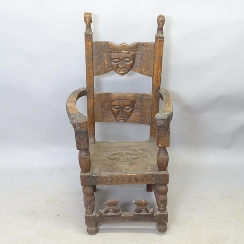 2705 - An early 20th century Chokwe African tribal Chieftain's chair, the figural carved wood with patinati... 