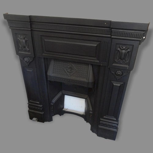 2697 - An Antique cast-iron fire surround, with tiled panels and brass hood, 91cm x 97cm, and another fire ... 