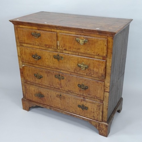 2353 - A 19th century cross banded walnut chest of 2 short and 3 long drawers, on bracket feet. 111 x 109 x... 