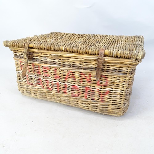 2710 - A wicker laundry basket with leather bindings, lettering to frontage - Pineland laundry. 78 x 38 x 5... 