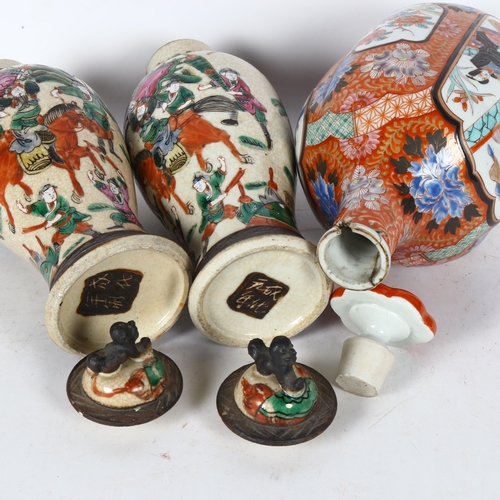 777 - A Japanese porcelain bottle and stopper, with hand painted decoration, 6 character mark, height 27cm... 