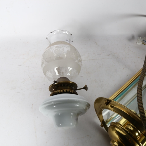 791 - A brass-framed circular lantern with 3 bayonet fittings, length 73cm, and a hanging oil lamp with et... 