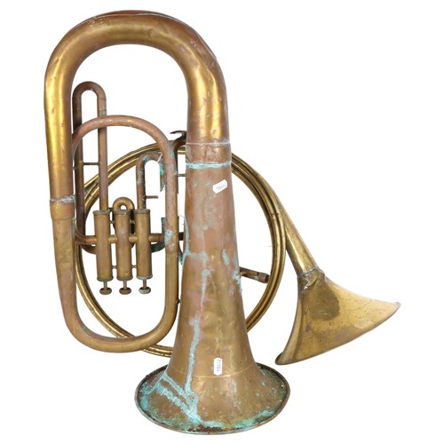 208 - J.R. Lafleur & Sons Ltd - an antique copper tuba, serial number 204071, and a copper french horn.