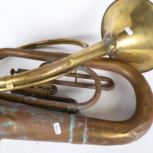 208 - J.R. Lafleur & Sons Ltd - an antique copper tuba, serial number 204071, and a copper french horn.