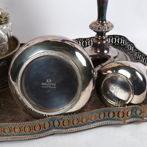 919 - A rectangular silver plated serving tray with raised gallery, a 2-branch table candelabra, condiment... 