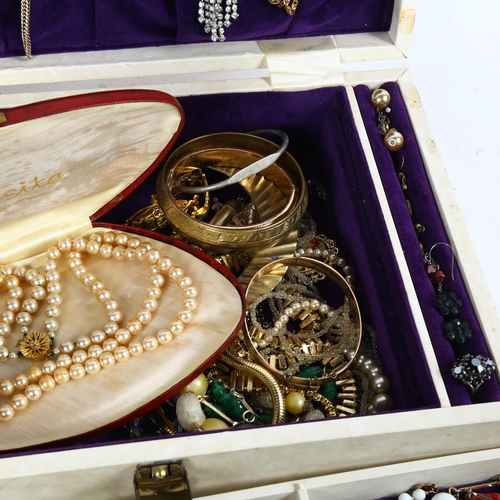 928 - A quantity of modern and other costume jewellery, a silver ring, earrings, brooches etc, in a fitted... 