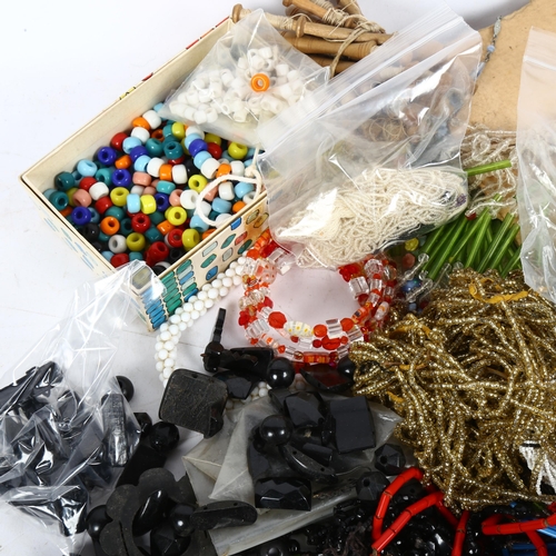 930 - A collection of various beads, bobbins etc